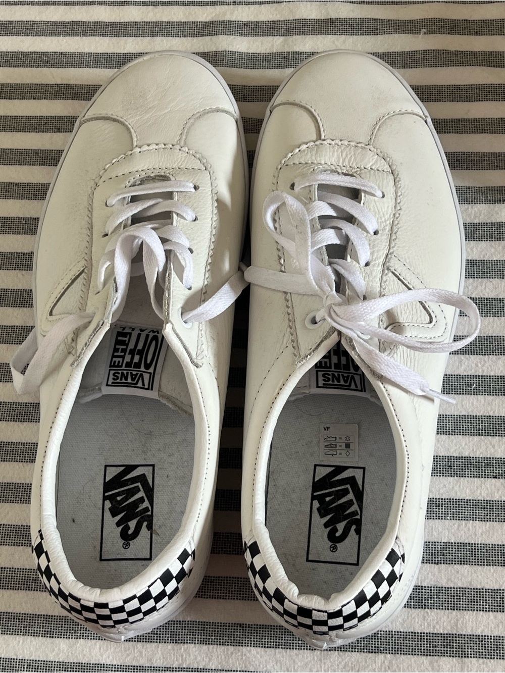 Vans White Leather Sneakers with Black Logo Tag